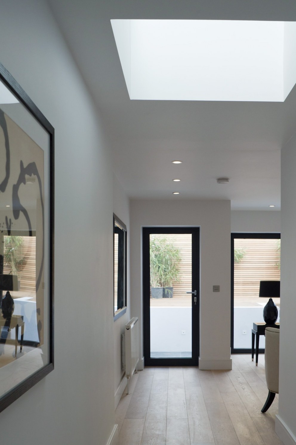 Clapham Flat | Entrance Hall with skylight | Interior Designers